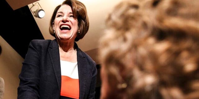 Democratic presidential candidate U.S. Sen. Amy Klobuchar, D-Minn., shakes hands with a supporter after a roundtable discussion on voting rights at the International Civil Rights Center & Museum in Greensboro, N.C., on Thursday, Feb. 27, 2020. (Khadejeh Nikouyeh/News & Record via AP)