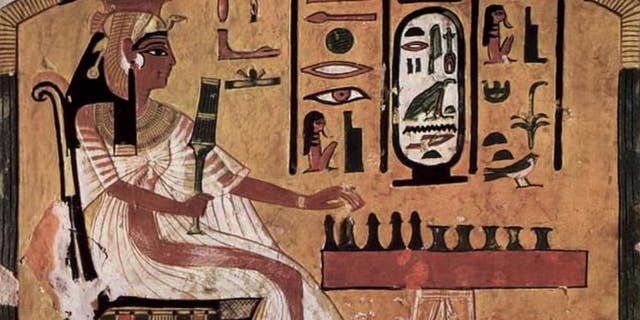 The game, known as senet, was played by Egyptians at all levels of society. Pictured above: Queen Nefertari plays senet in a piece of art inside her tomb.