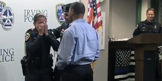 Irving Police Officer Erika Benning burst into tears after her son, Sgt. Giovanni Pando, surprised her during her swearing-in ceremony.