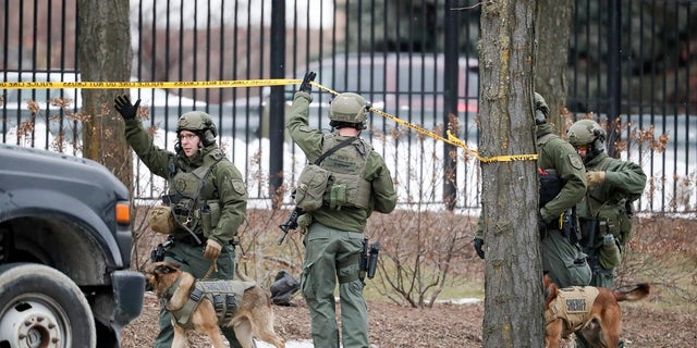 Police respond to reports of an active shooting at the Molson Coors Brewing Co. campus in Milwaukee on Wednesday. (AP Photo/Morry Gash)