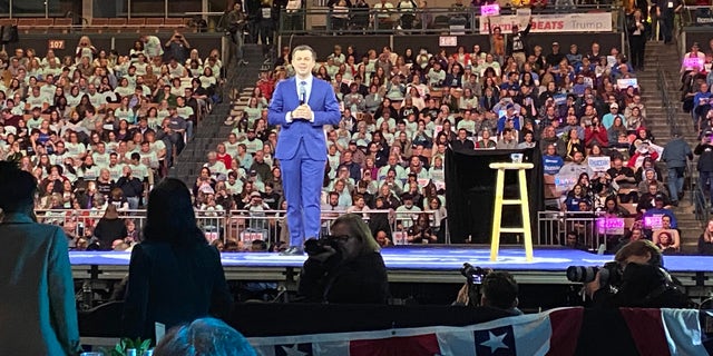 Democratic presidential candidate Pete Buttigieg faces taunts from supporters of rival Sen. Bernie Sanders as he speaks at a major New Hampshire Democratic Party Dinner in Manchester, N.H., on Feb. 8, 2020. (Fox News)