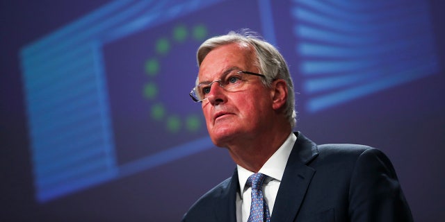 European Union chief Brexit negotiator Michel Barnier talks to journalists during a news conference at the European Commission headquarters in Brussels, Monday, Feb. 3, 2020. (AP Photo/Francisco Seco)