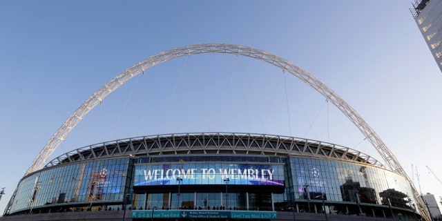 FILE - This Oct. 3, 2018 file photo shows a view of the exterior of Wembley Stadium in London. The Jacksonville Jaguars will play two home games in London next season, strengthening the franchise’s foothold in an overseas market the NFL is eager to expand. (AP Photo/Kirsty Wigglesworth, File)