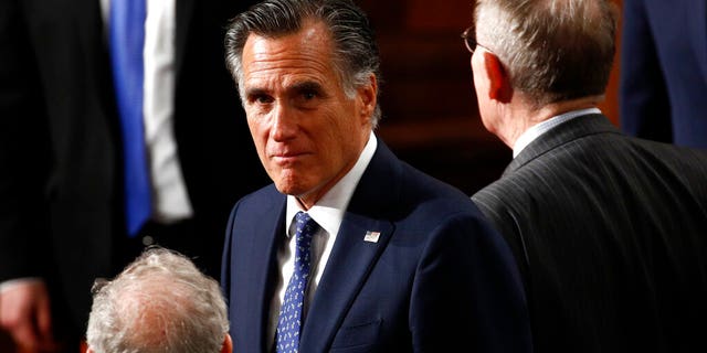 Sen. Mitt Romney, R-Utah, arrives before President Donald Trump delivers his State of the Union address to a joint session of Congress on Capitol Hill in Washington, Tuesday, Feb. 4, 2020. (AP Photo/Patrick Semansky)