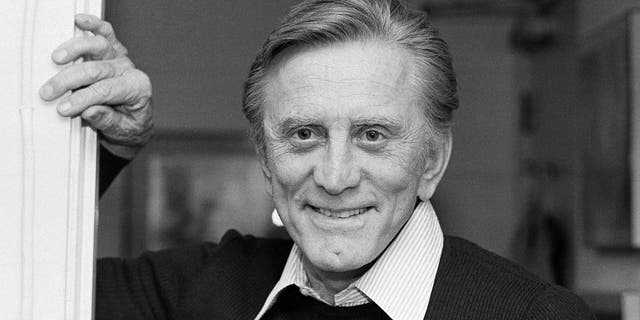 FILE - This Nov. 16, 1982 file photo shows actor Kirk Douglas at his home in Beverly Hills, Calif. Douglas died Wednesday, Feb. 5.