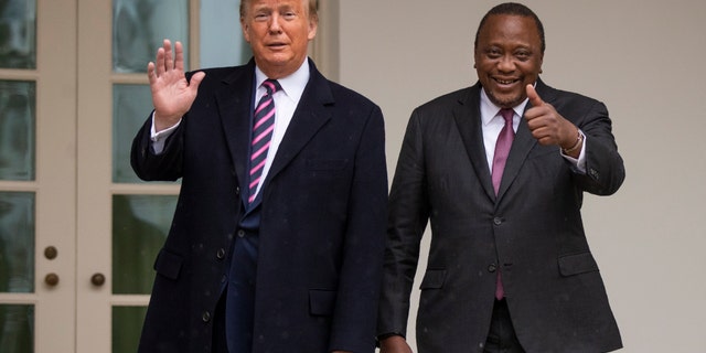 President Donald Trump welcomes Kenyan President Uhuru Kenyatta at the White House, Thursday, Feb. 6, 2020, in Washington. (AP Photo/Manuel Balce Ceneta)
