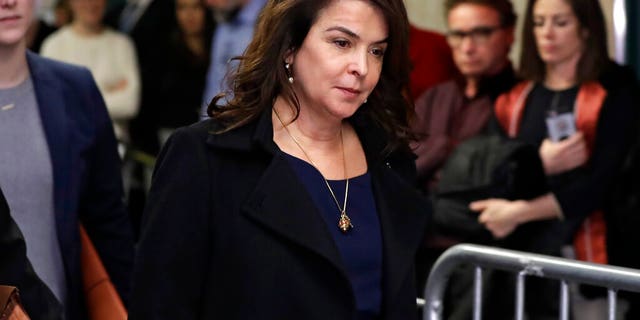 In this Thursday, Jan. 23, 2020 file photo, actress Annabella Sciorra returns after a lunch break in Harvey Weinstein's rape trial in New York.