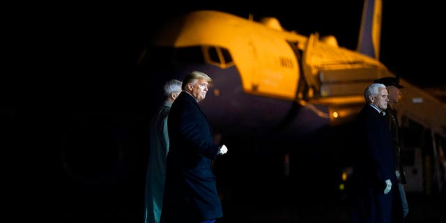 President Donald Trump and Vice President Mike Pence depart after watching a casualty return for Sgt. 1st Class Javier Gutierrez, of San Antonio, Texas and Sgt. 1st Class Antonio Rodriguez, of Las Cruces, N.M., Monday, Feb. 10, 2020, at Dover Air Force Base, Del. According to the Department of Defense both died Saturday, Feb. 8, during combat operations in Afghanistan. (AP Photo/Evan Vucci)