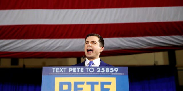 Then-Democratic presidential candidate former South Bend, Ind., Mayor Pete Buttigieg speaks to supporters at a primary night election rally at Nashua Community College, Tuesday, Feb. 11, 2020, in Nashua, Iowa.
