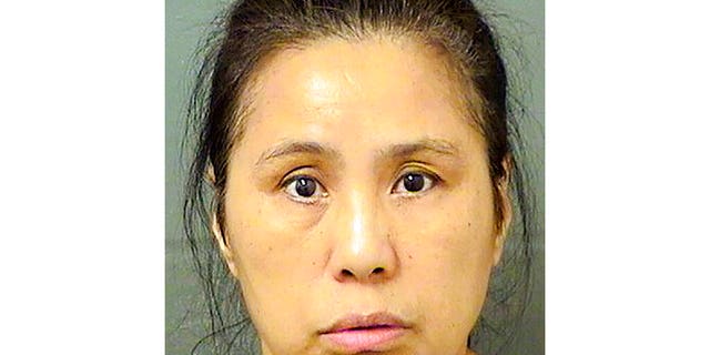 This Wednesday, Dec. 18, 2019, file booking photo provided by the Palm Beach County Sheriff's Office, in Fla., shows Jing Lu. A Florida jury on Wednesday, Feb. 12, 2019 found Jing Lu, a 56-year-old Chinese woman, not guilty of trespassing at President Donald Trump's part time residence in Palm Beach.