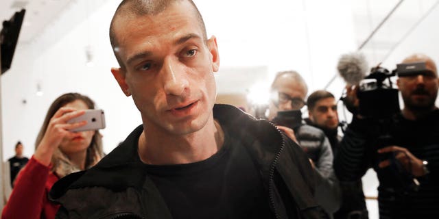FILE: Russian performance artist Pyotr Pavlensky arrives at the Paris courthouse, as he goes on trial after he set fire to the facade of France's central bank in Paris.