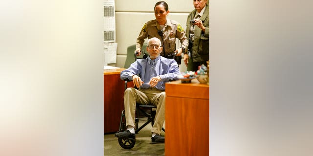 In this Jan. 6, 2017 file photo real estate heir Robert Durst is wheeled into a courtroom in a Los Angeles Superior Court Airport Branch in Los Angeles. Durst faces trial in the slaying of his best friend 20 years ago. Jury selection begins Wednesday, Jan.19, 2020, in Los Angeles. (Mark Boster/Los Angeles Times via AP, Pool,File)