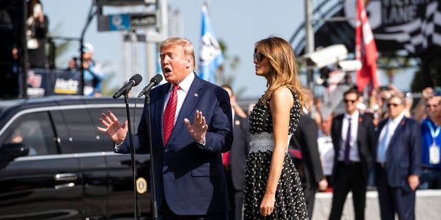 President Trump, accompanied by first lady Melania Trump, giving the instructions "gentlemen, start your engines," before the start of the Daytona 500.