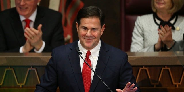 Ducey during his 2020 State of the State address as Senate President Karen Fann, R-Prescott, right, and House Speaker Rusty Bowers, R-Mesa, left, listen in on the opening day of the legislative session at the Capitol in Phoenix.