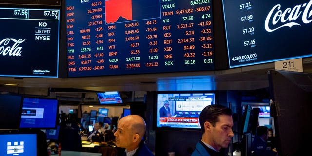 Whistleblower says HHS sent workers to handle possible coronavirus patients without gear, training 5 Stocks reflect declines on monitors as people work on the floor of the New York Stock Exchange Thursday, Feb. 27, 2020. (AP Photo/Craig Ruttle)
