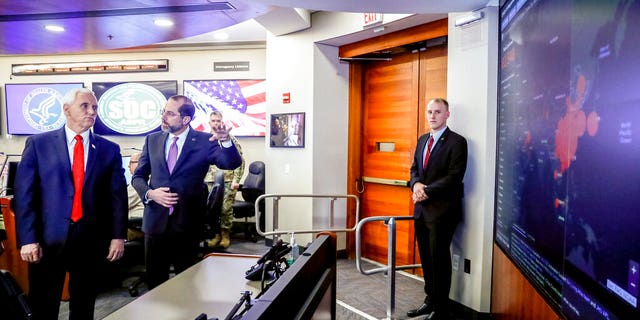 Whistleblower says HHS sent workers to handle possible coronavirus patients without gear, training 3 Vice President Mike Pence, left, and Health and Human Services Secretary Alex Azar, second from left, look at a large monitor displaying a tally of total coronavirus cases, deaths, and recovered, as they tour the Secretary's Operations Center following a coronavirus task force meeting at the Department of Health and Human Services, Thursday, Feb. 27, 2020, in Washington. (AP Photo/Andrew Harnik)