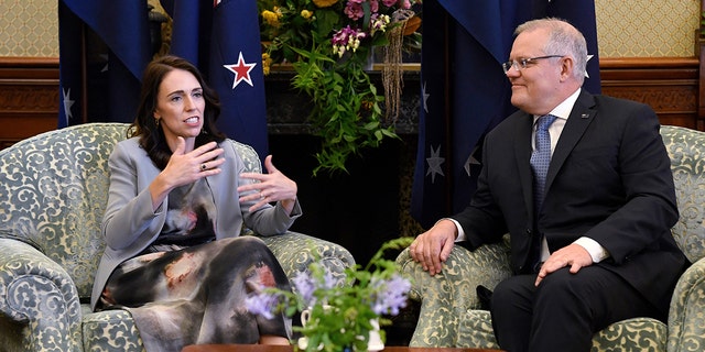 New Zealand Prime Minister Jacinda Ardern, left, talks with Australian Prime Minister Scott Morrison during a meeting at Admiralty House in Sydney, Friday, Feb. 28, 2020. (Bianca De Marchi/Pool Photo via AP)