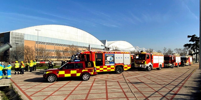 Emergency personnel and firefighters take positions at the Adolfo Suárez-Barajas International Airport in Barajas, outskirts of Madrid, on Monday, Feb. 3.