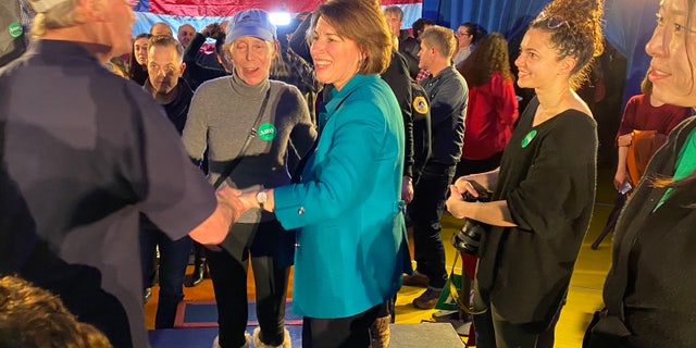 Democratic presidential candidate Sen. Amy Klobuchar of Minnesota shakes hands with voters after a rally in Des Moines, IA on Feb. 1, 2020