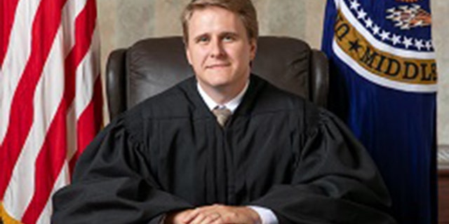 Judge Andrew Brasher in his official photo as a judge on the U.S. District Court for the Middle District of Alabama. (almd.uscourts.gov)
