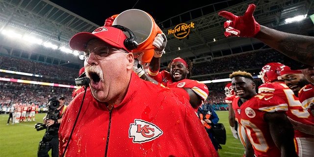 Kansas City Chiefs head coach Andy Reid reacts after being doused during the second half of the NFL Super Bowl 54 football game against the San Francisco 49ers Sunday, Feb. 2, 2020, in Miami Gardens, Fla. (AP Photo/David J. Phillip)