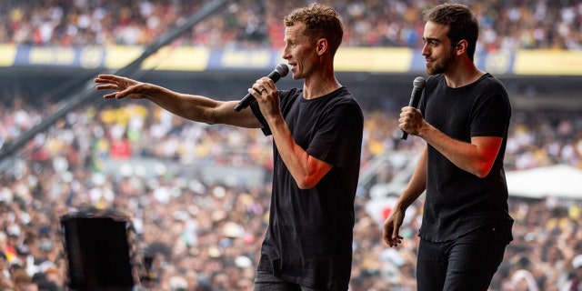 Andy Byrd, The Send Brazil co-organizer and YWAM leader, speaks with a translator in Morumbi Stadium in Sao Paulo.