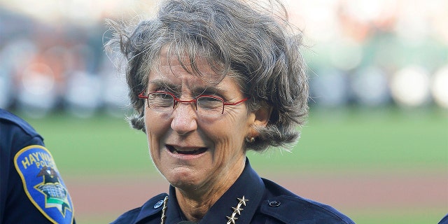 FILE - In this July 25, 2017 file photo, Oakland, Calif., Police Chief Anne Kirkpatrick stands before a baseball game between the San Francisco Giants and the Pittsburgh Pirates in San Francisco. (AP Photo/Jeff Chiu, File)