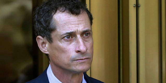 Former Congressman Anthony Weiner leaves federal court following his sentencing in New York.