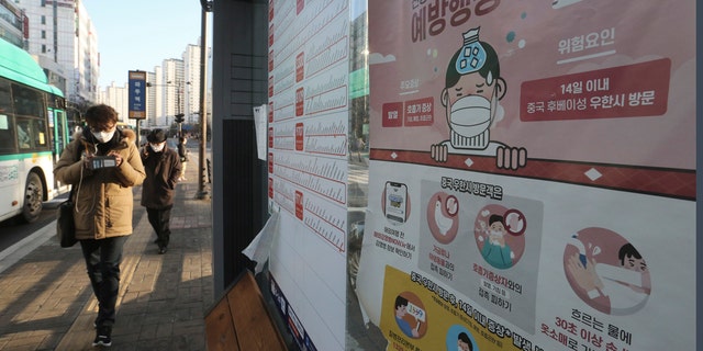 A poster detailing precautions to take against the coronavirus is seen at a bus station in Goyang, South Korea, Sunday, Feb. 23, 2020.
