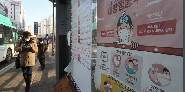 A poster detailing precautions to take against the coronavirus is seen at a bus station in Goyang, South Korea, Sunday, Feb. 23, 2020.