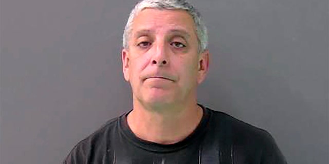 This Monday, Feb. 10, 2020, booking photo provided by the Bell County Jail shows Temple Police officer Carmen DeCruz. (Bell County Jail via AP)