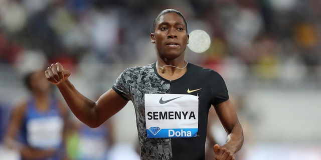 In this May 3, 2019, file photo, South Africa's Caster Semenya crosses the finish line to win gold in the women's 800-meter final during the Diamond League in Doha, Qatar. 