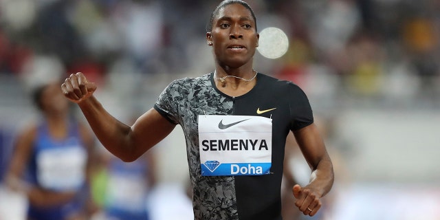 In this May 3, 2019, file photo, South Africa's Caster Semenya crosses the finish line to win gold in the women's 800-meter final during the Diamond League in Doha, Qatar. 