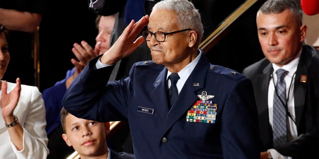 Trump honors one of the last surviving Tuskegee Airmen during State of the Union address 2 Tuskegee airman Charles McGee, 100, salutes as his great grandson Iain Lanphier looks as President Donald Trump delivers his State of the Union address to a joint session of Congress on Capitol Hill in Washington, Tuesday, Feb. 4, 2020. (AP Photo/Patrick Semansky)