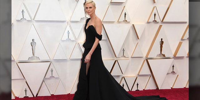 Charlize Theron arrives at the Oscars on Sunday, Feb. 9, 2020, at the Dolby Theatre in Los Angeles