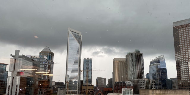 Ominous clouds hang over downtown. Charlotte, North Carolina, on Thursday, Feb. 6, 2020. The city and surrounding areas were under the threat of severe weather during the morning and into the afternoon as a powerful storm rumbled through the Deep South.