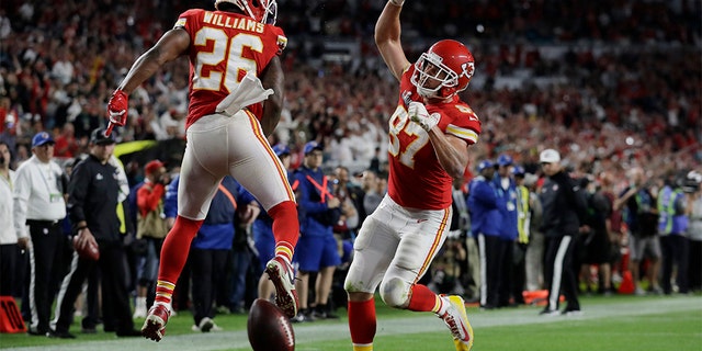 Kansas City Chiefs' Travis Kelce (87) celebrates his touchdown with Kansas City Chiefs' Damien Williams during the second half of the NFL Super Bowl 54 football game against the San Francisco 49ers, Sunday, Feb. 2, 2020, in Miami Gardens, Fla. (AP Photo/Lynne Sladky)