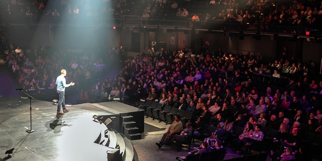 Crossroads Church Pastor Brian Tome speaks to his congregation. The Cincinanti megachurch is not holding in-person services through the end of 2020.