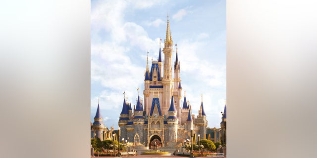 Conceptual images of the design show more vibrant colors and additional gold trim on the outside of the castle.