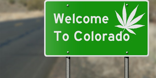 Highway sign as a reference to Colorado's laws regarding the use of marijuana. Cannabis companies are using the state’s program to keep freeways clean as a tool to advertise amid tight restrictions on marijuana marketing.