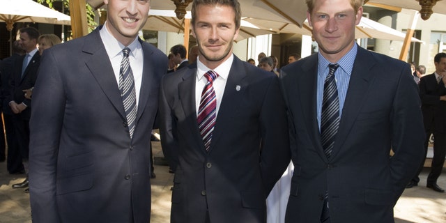 Prince William, David Beckham and Prince Harry in 2010. (Photo by Samir Hussein/Wireimage via Getty)