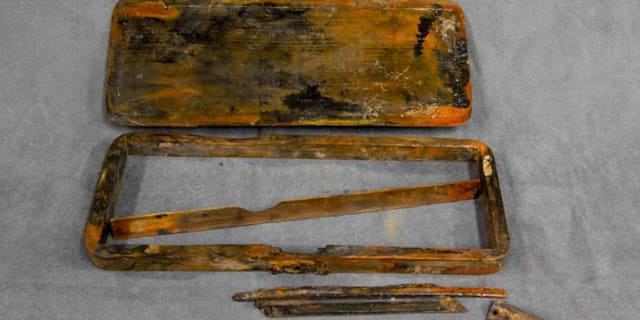 The pencil case was discovered in a drawer in what is believed to be the Captain's Steward's pantry. (Parks Canada)