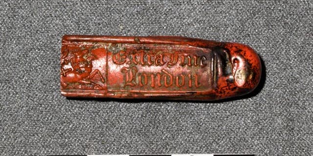Sealing wax recovered from the pantry (storage room) of the captain's steward on HMS Erebus. The wax, which was used to seal letters and envelopes, is marked 