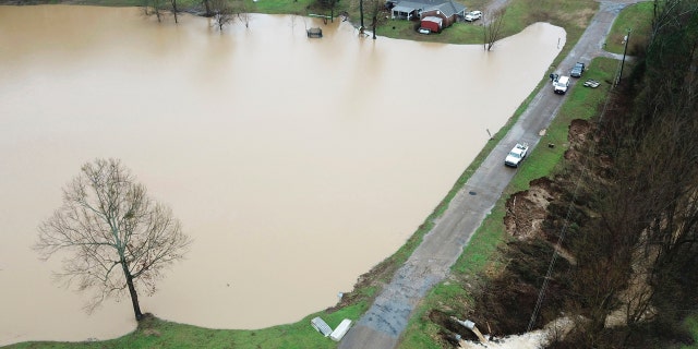 This aerial drone photo provided by the Mississippi Emergency Management Agency shows a potential dam/levee failure in the Springridge Place subdivision in Yazoo County, Miss., Tuesday, Feb. 11, 2020.