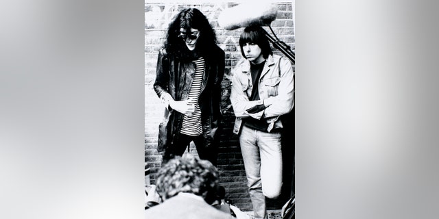 Joey (left) and Johnny Ramone posing for a portrait, circa 1988.