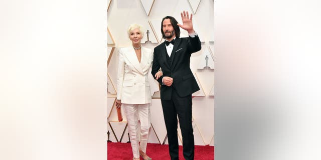 Patricia Taylor, left, and Keanu Reeves attends the 92nd Annual Academy Awards at Hollywood and Highland on February 09, 2020 in Hollywood, Calif. (Photo by Amy Sussman/Getty Images)