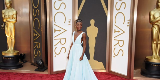 Lupita Nyong'o arrives at the 86th Annual Academy Awards at Hollywood & Highland Center on March 2, 2014 in Hollywood, California. 