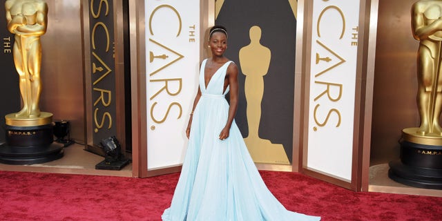 Lupita Nyong'o arrives at the 86th Annual Academy Awards at Hollywood & Highland Center on March 2, 2014 in Hollywood, California.