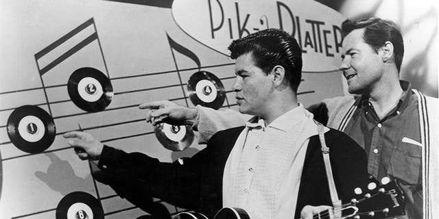Ritchie Valens (Richard Steven Valenzuela) and president of Del-Fi Records Bob Keane on a TV show in 1958 in Los Angeles, California.