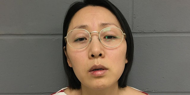 This undated photo provided by the West Des Moines, Iowa Police Department shows Gowun Park. Park was charged with first-degree murder and first-degree kidnapping in the death of her husband, Sung Nam. Park was arrested Wednesday. (West Des Moines Police Department via AP)